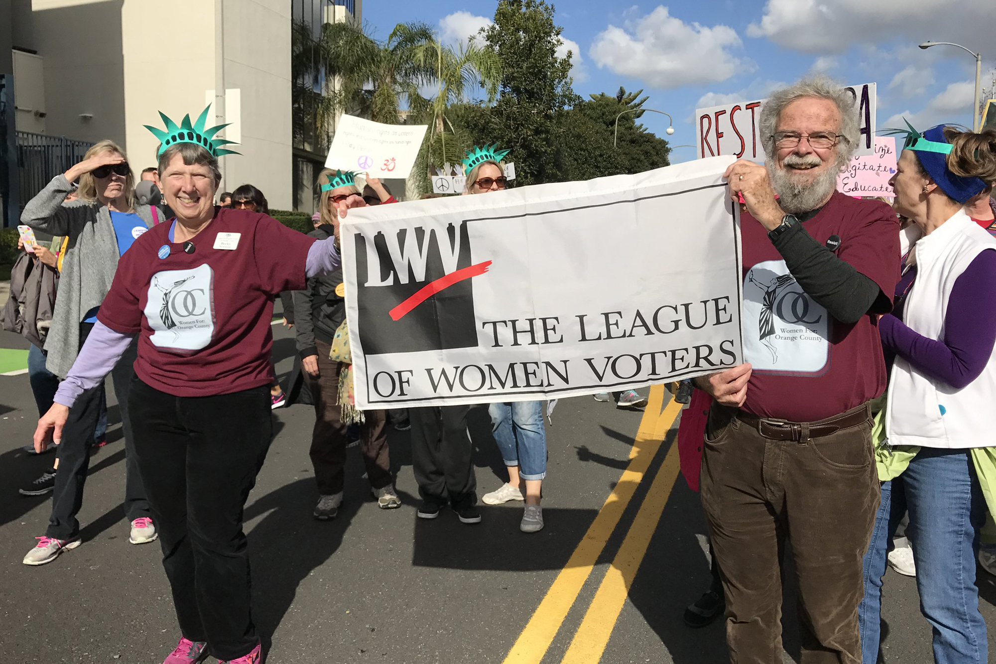 League of Women Voters supporters, marching.