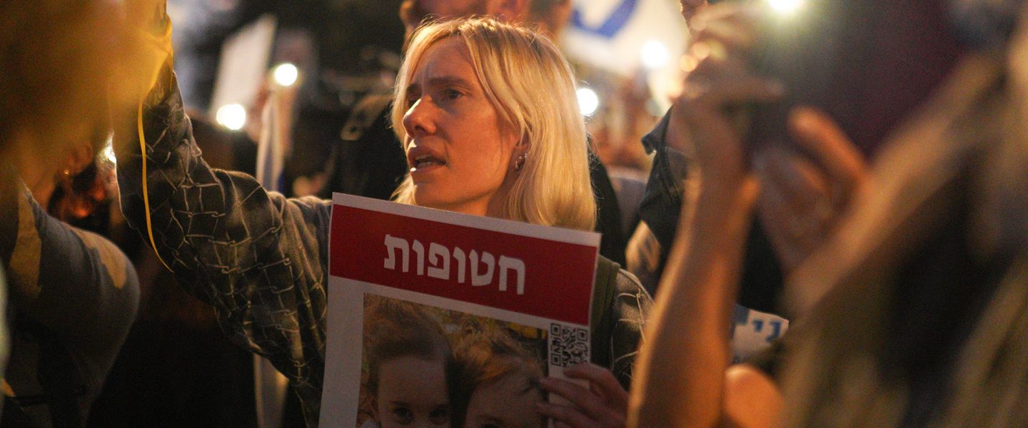 Woman protesting, Release of Hostages