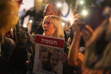 Woman protesting, Release of Hostages