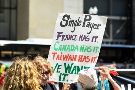 Protestor, Sign for Single Payer healthcare, Chicago, 2012 NATO Summit