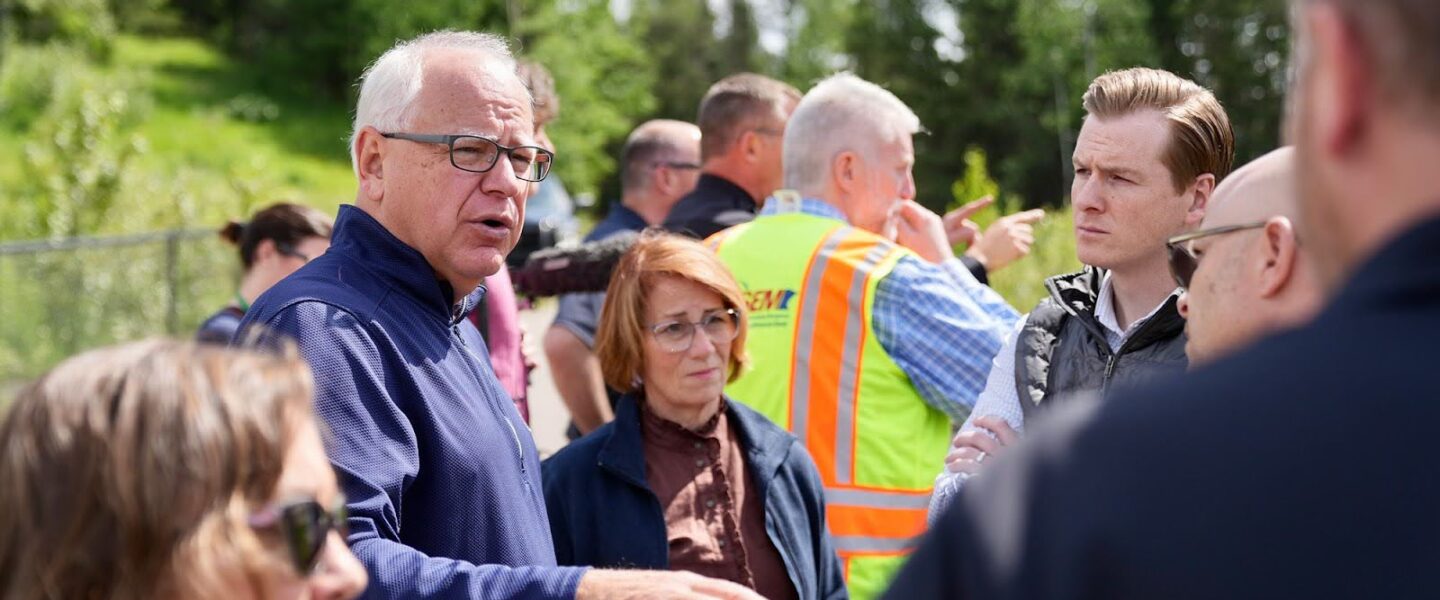 Tim Walz, surveys flood damage