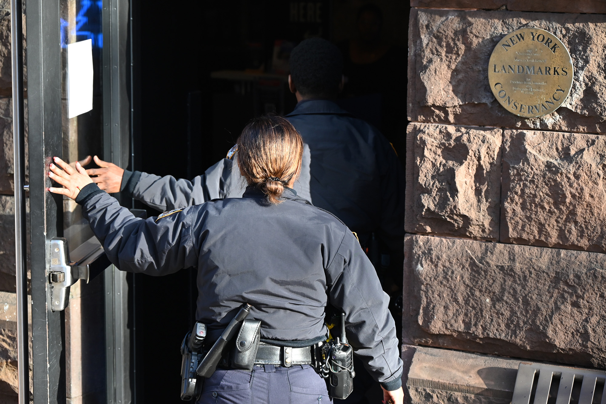 Police investigate, New York City Hostel.