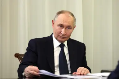 Russia, President, Vladimir Putin, seated, documents