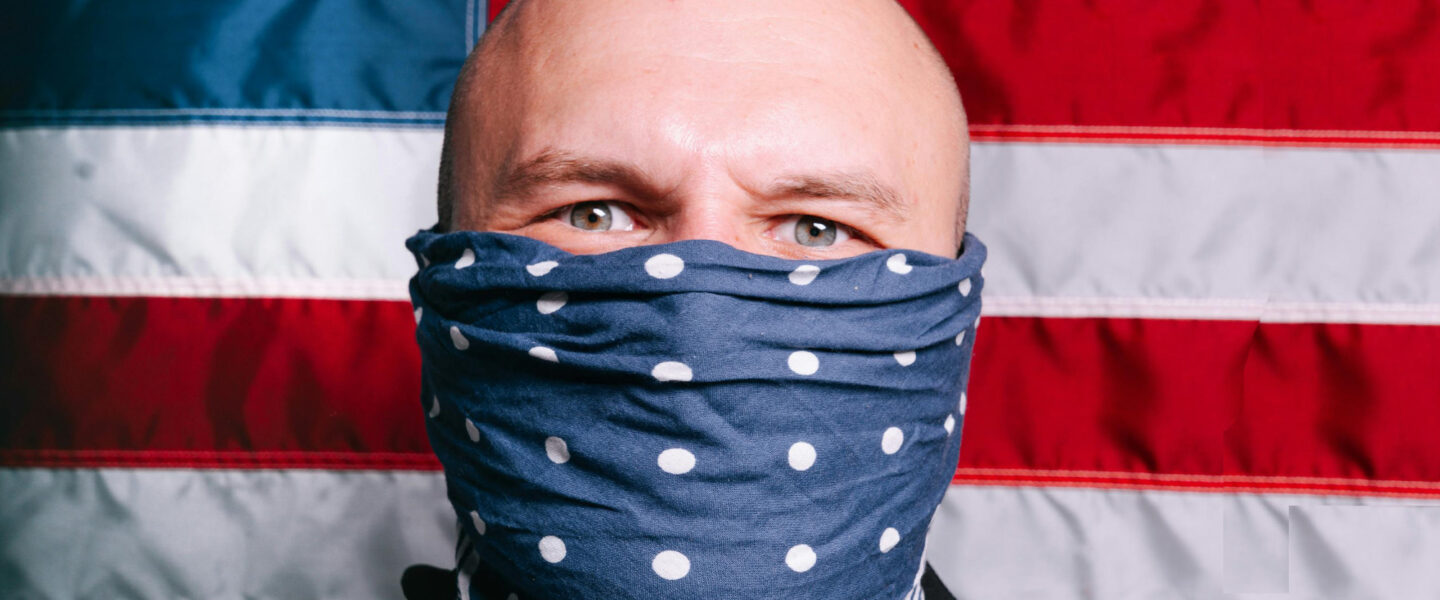 masked man, American flag