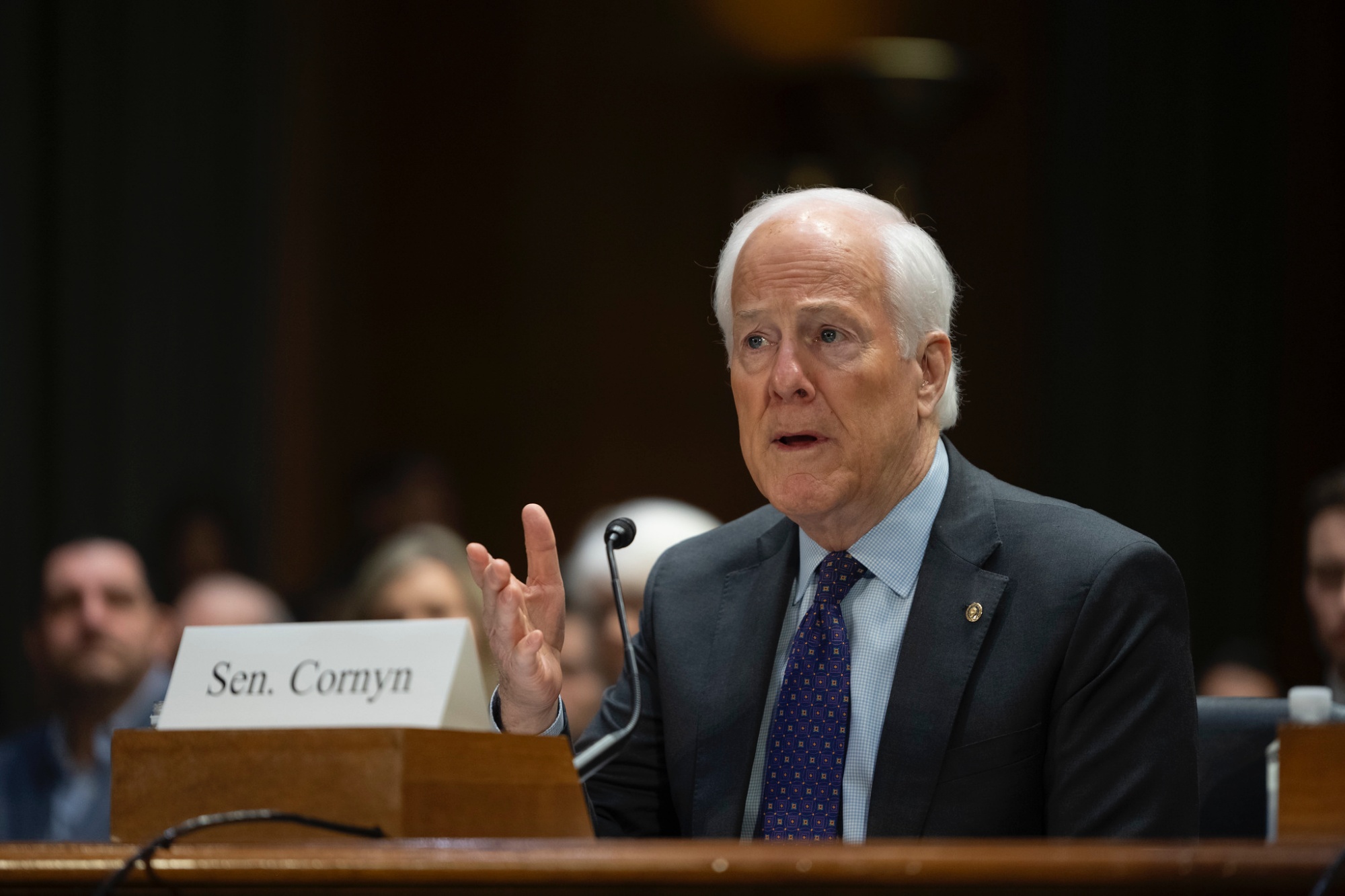 John Cornyn, microphone, speaking