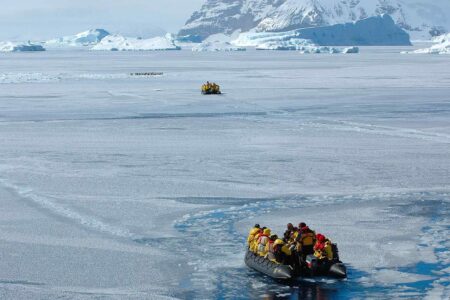 Explorers, zodiacs, sea ice, Snow Hill, Antarctica