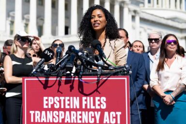 Lisa Phillips, speaks, news conference, Epstein survivors