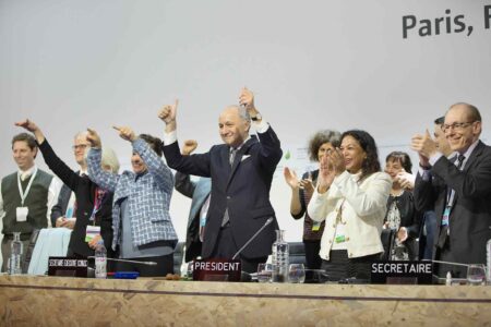 UN delegates, celebrate, Paris Agreement, Climate Change Conference, 2015