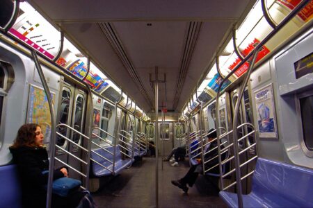 tech, AI, wearable devices, critics, NYC subway ads, vandalism