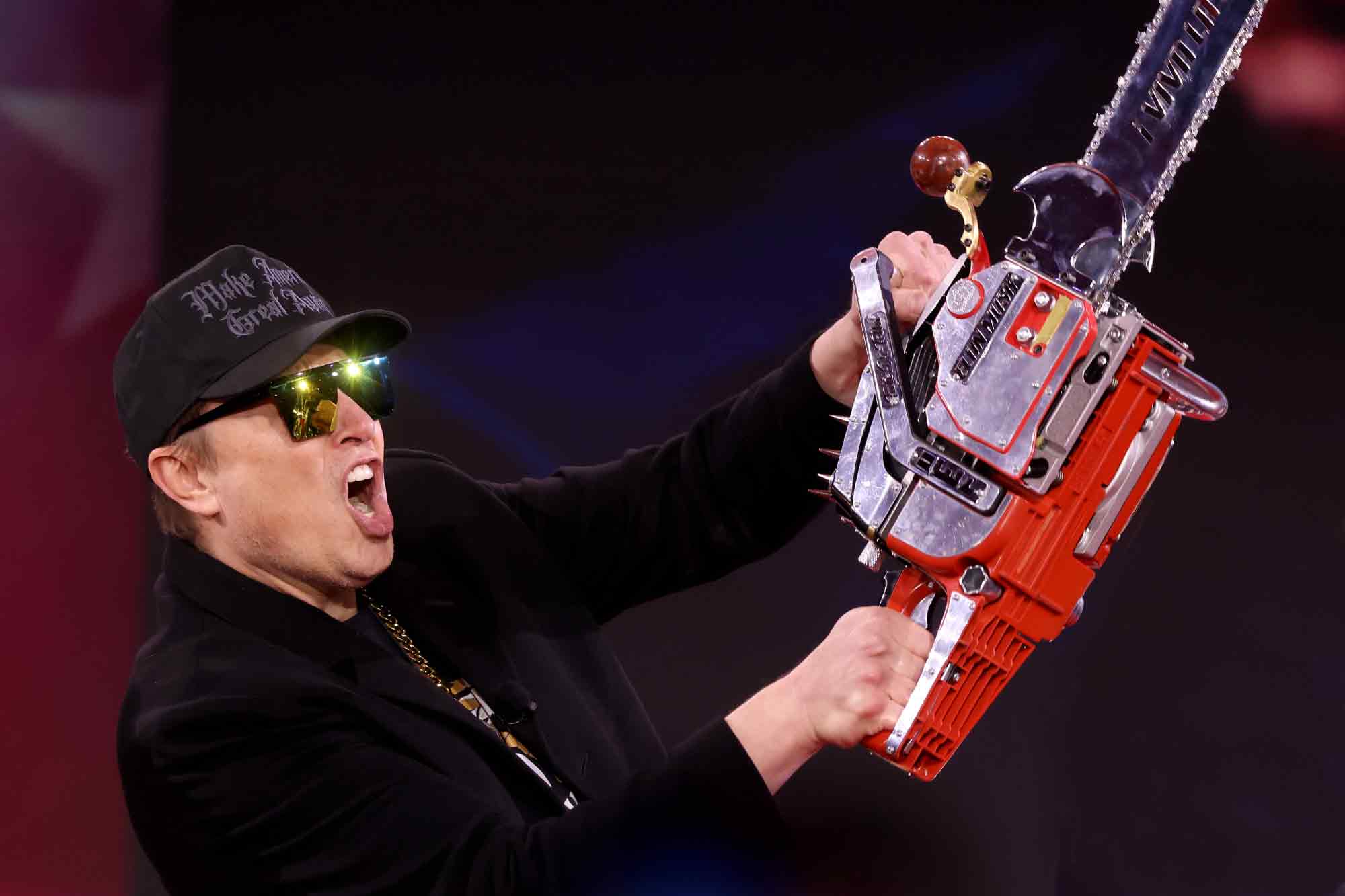 Elon Musk, government workers, cuts, chainsaw, rage