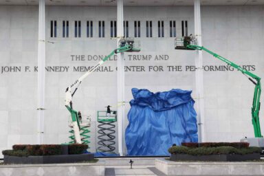 Workers add Trump's name, Donald J. Trump, Kennedy Center
