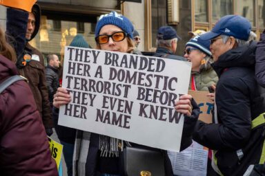 They Branded Her A Domestic Terrorist Before They Even Knew Her Name, protest sign