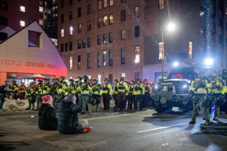 Police, face-off, anti-ICE protesters, Minneapolis