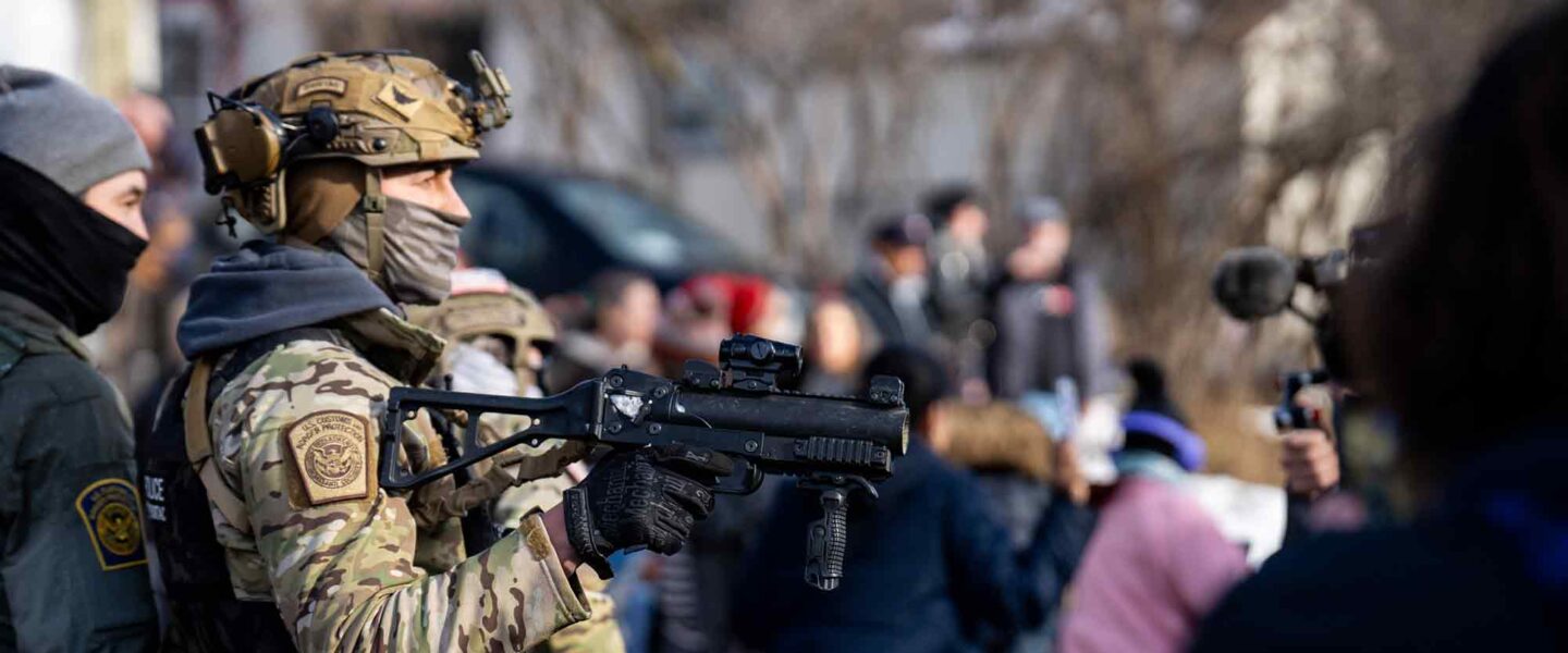 federal agent points weapon, less lethal, anti-ICE protesters