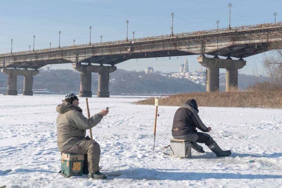 Ice fishermen, Dnipro River, Kyiv, Ukraine