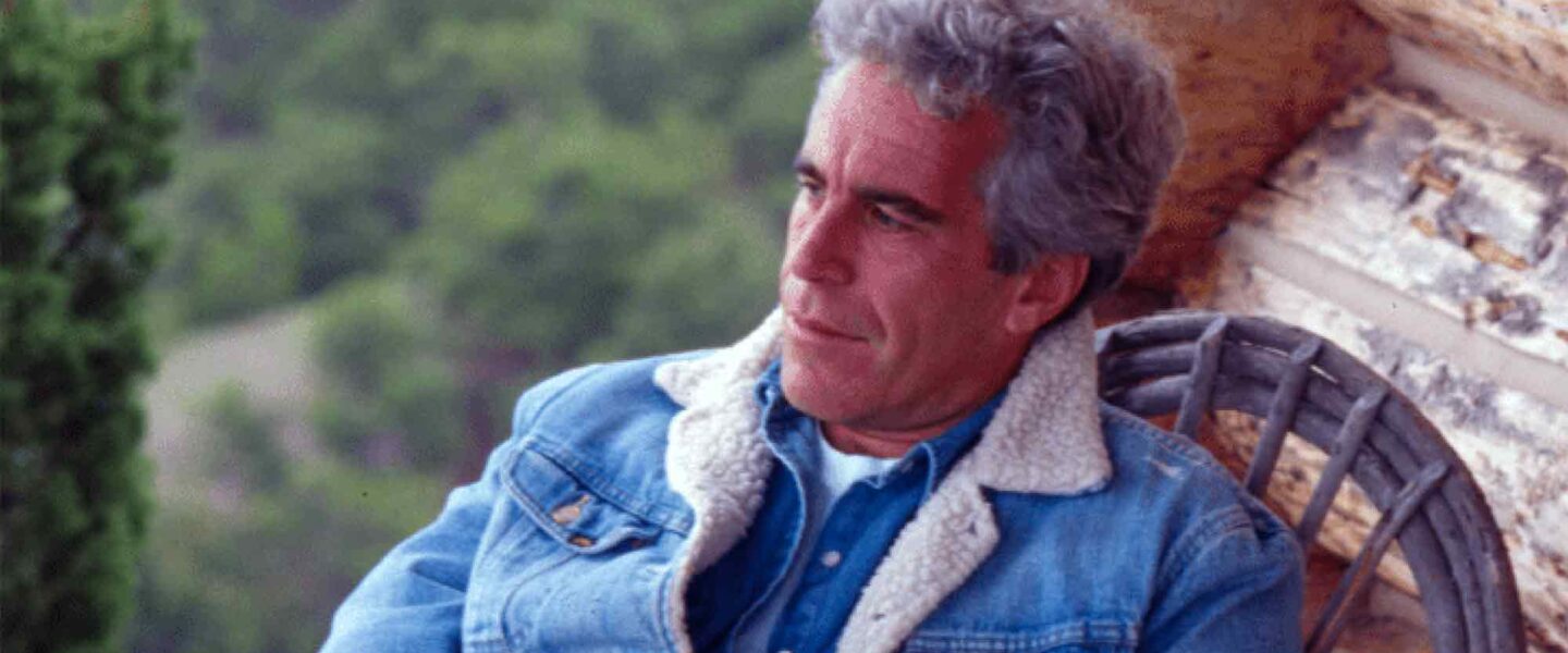 Jeffrey Epstein, sitting, wicker chair