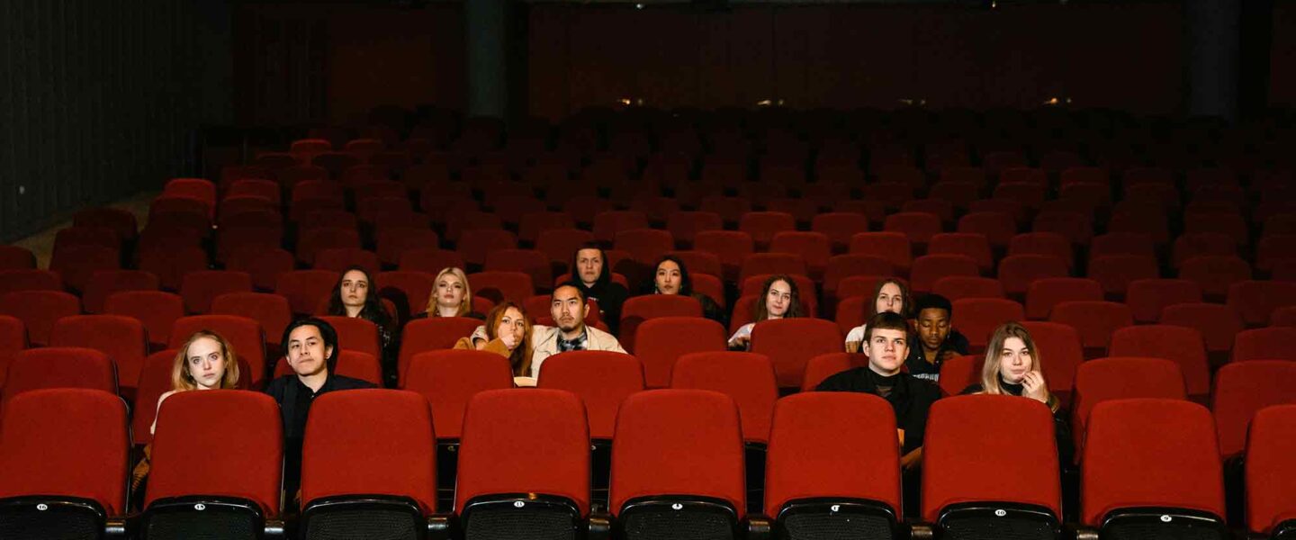 small audience, movie theater