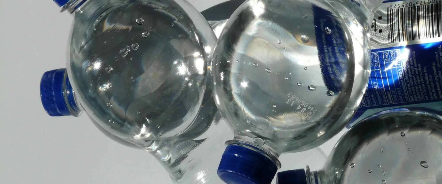 Four, plastic, water bottles