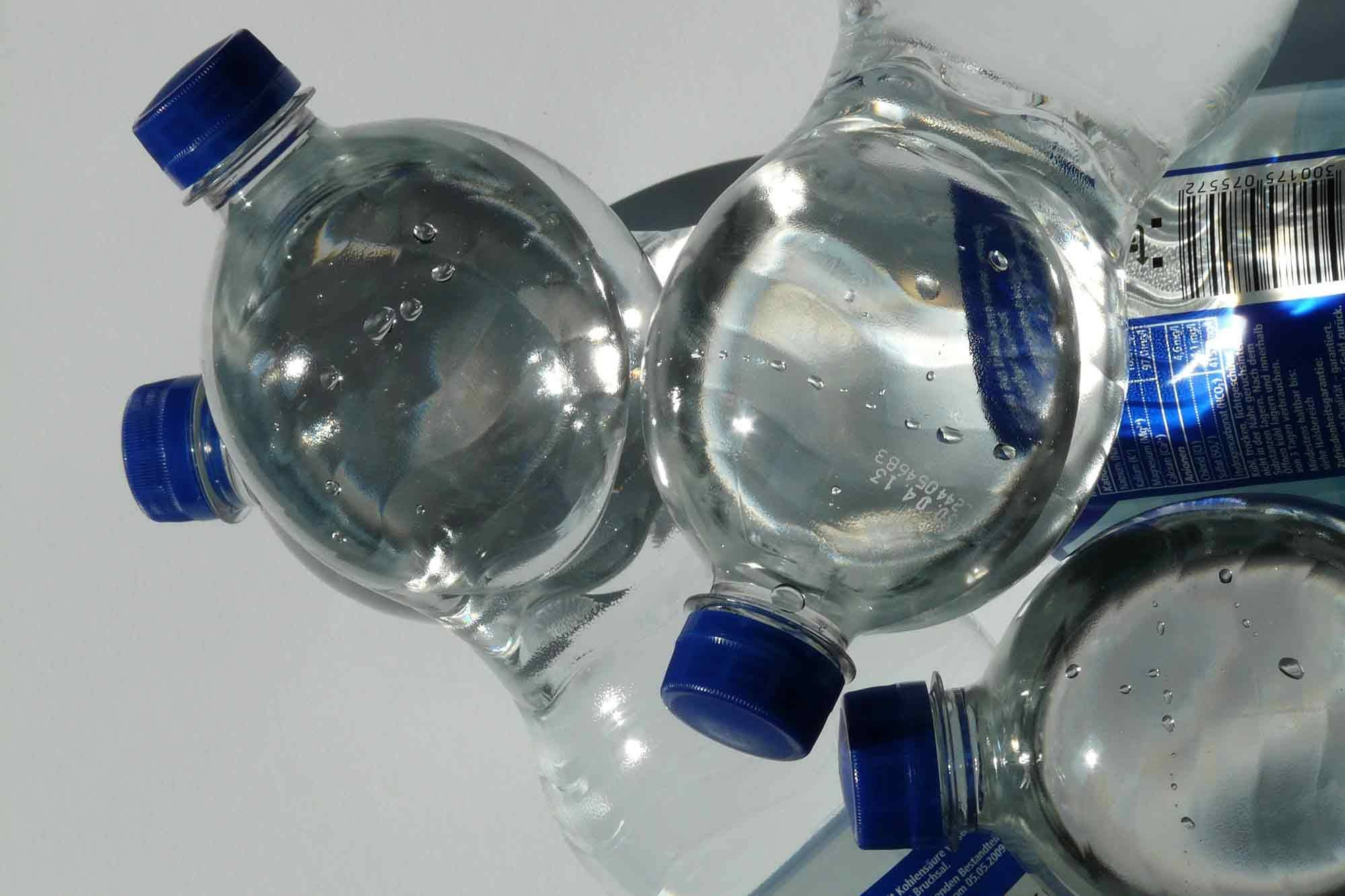 Four, plastic, water bottles