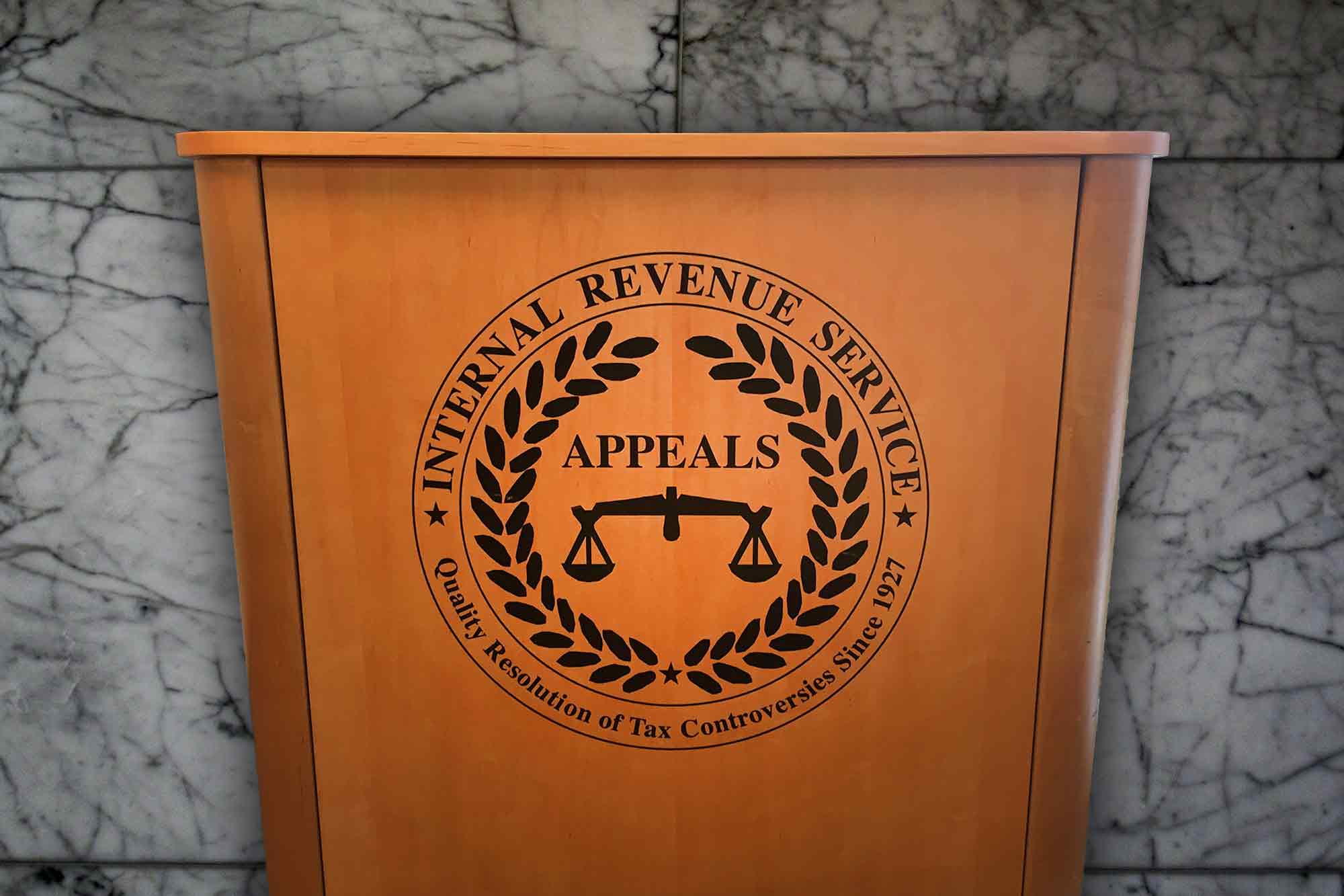 US_IRS_Office_of_Appeals_Seal_on_Lectern_3x2.jpg