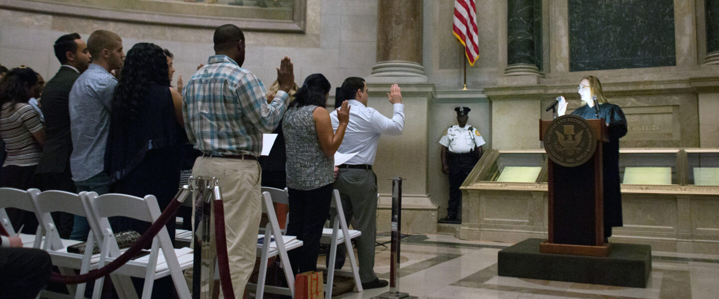 Citizenship candidates, take the oath of allegiance, naturalization ceremony