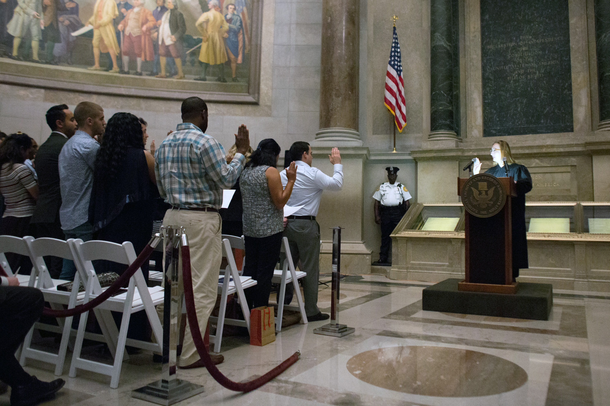 Citizenship candidates, take the oath of allegiance, naturalization ceremony