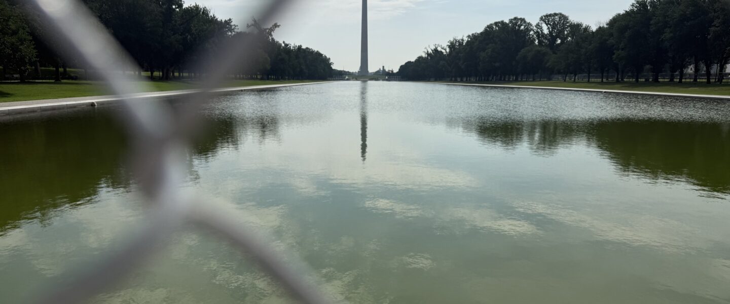 Reflecting Pool. Washington Monument, Chain link fence